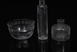 P. Martinuzzi (Venezia, 1933 – 2010), Untitled (little vase, tall vase and bowl with geometric patterns), early ‘80s, Unique piece, Hand-blown glass, acid-etched, engraved with diamond pen, Little vase h 5,4 x Ø 6 cm, Tall vase: h 12,4 x Ø 3 cm, Bowl: h 4,5 x Ø 9,5 cm
